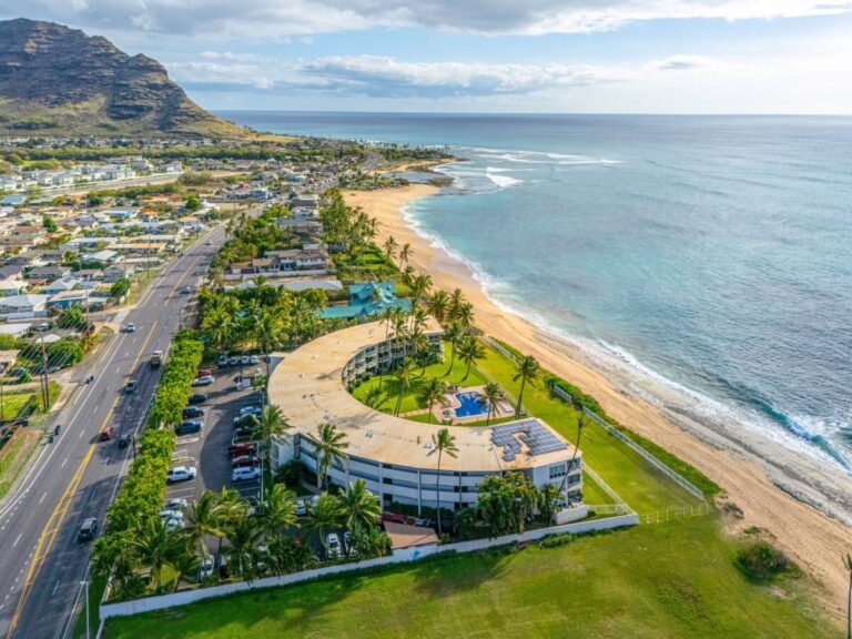 aerial view of condo complex along ocean hawaii